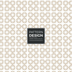 Seamless vintage geometric leaf pattern design, gold on white background.