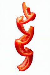 Sliced Red Bell Pepper Floating in MidAir on White Background.