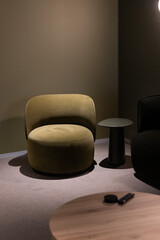 Modern green armchair minimalist round side table office corner