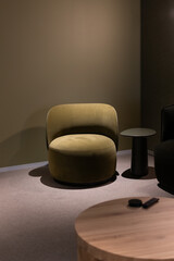 Modern green armchair minimalist round side table office corner