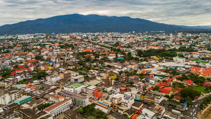 drone aerial of Chiang Mai Thailand cityscape old town temples mountains and ping river