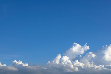 Blue sky background and Cumulus clouds  with copy space