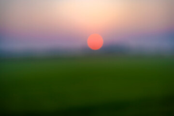 Abstract and blurred bokeh of the first sunlight in the morning, can be used as a background