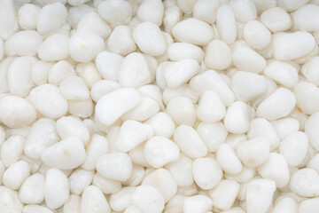 Close up of white pebble stones texture for background , Zen stone background