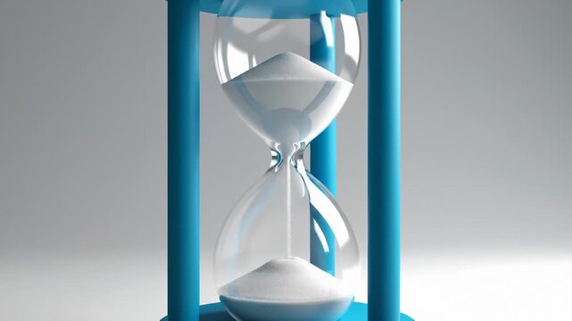 White Sand Falling Inside Blue Framed Hourglass, Time Concept