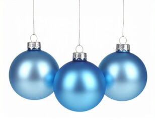 Three shimmering blue Christmas baubles delicately suspended against a bright white background, creating a serene and elegant festive display perfect for holiday cheer and winter celebrations