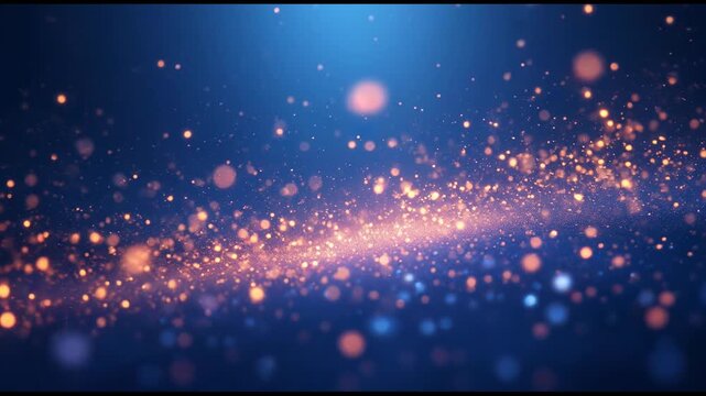 Glowing golden particles float and sparkle in dark blue space with magical orange and blue light creating abstract bokeh glow effects full of depth
