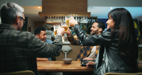 Friends, toast beer and celebration at bar, excited and bonding at party, happy hour and drinks. People, glasses and cheers at pub with alcohol, success or social gathering with reunion at night