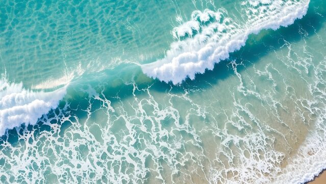 Aerial view of turquoise ocean waves crashing on sandy beach for summer vacation travel background image