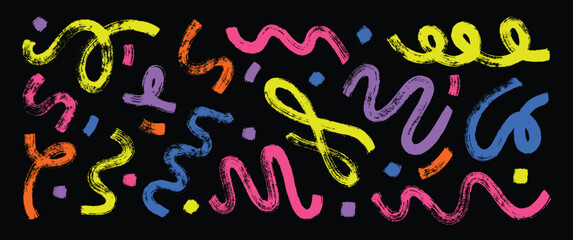Confettilike arrangement of colorful brushstroke style elements against a black background
