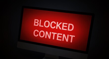 "Blocked content" message on red computer screen. Internet censorship and online restriction concept. Access denied warning for web filtering and security