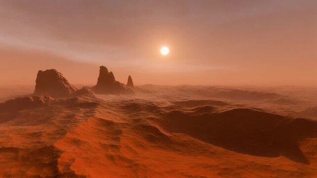 Beautiful sunrise over the grand canyon illuminates a red desert landscape with orange clouds and fog rolling through the valley under a stunning morning sky