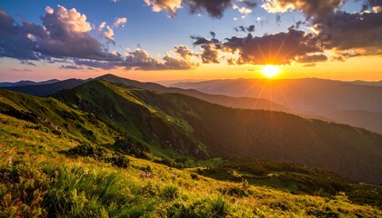 Obraz premium Majestic sunset over a verdant mountain range, illuminating the landscape with warm golden light