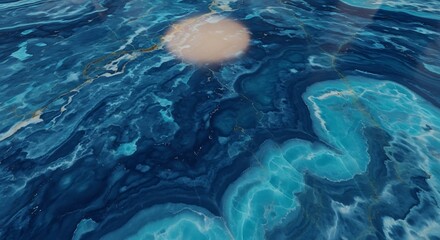 Abstract ocean surface with swirling blue water and pale circular element