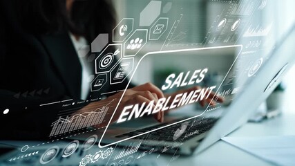 Business professional engaged in sales enablement strategy using laptop with digital graphics on screen for modern workplace solutions. Asymptotic smart data analytic. - Powered by Adobe