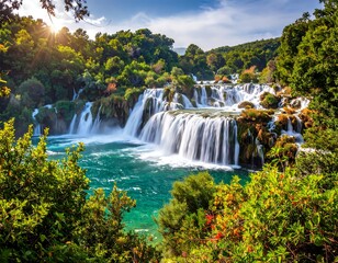 Obraz premium Scenic landscape featuring flowing waterfalls and lush, vibrant greenery