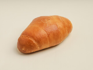 Danish pastry with savory filling on white background