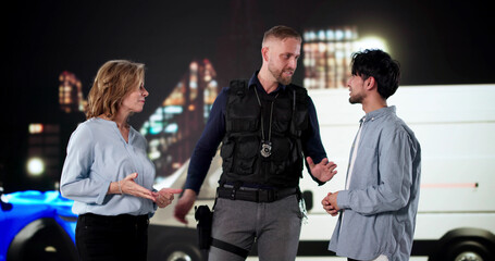 Fototapeta premium Late Night Collision: Two Drivers Argue, Police Intervene