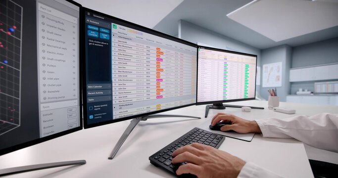 Doctor Coding Medical Bills In Hospital Using Spreadsheet