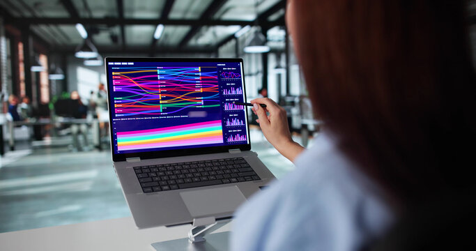 Top View Of Female Analyst Analyzing Sankey Chart