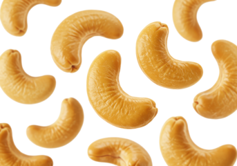 Multiple golden-brown, crescent-shaped, roasted cashew nuts, individually floating against a transparent background with copy space, sharply focused with macro details, high-key lighting. Concept