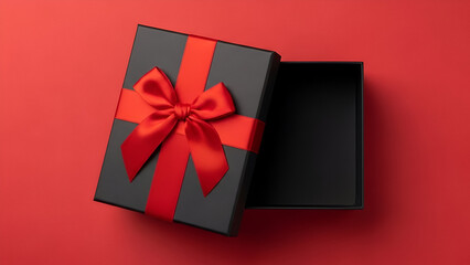 Open Black Gift Box With Red Ribbon on Red Background