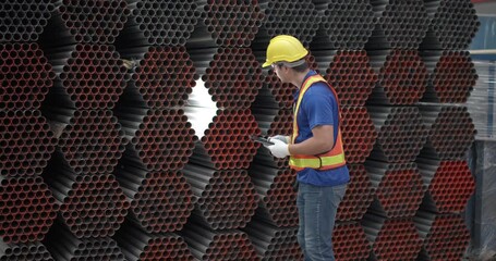 Metal sheet worker inspect materials to ensure they meet quality standards, precisely count inventory, and enhance environmental assurance in heavy industrial roofing and infrastructure projects.
