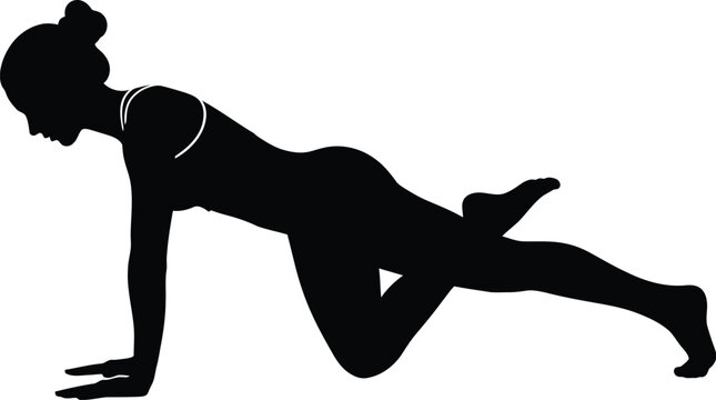 Silhouette of a woman in a plank exercise pose