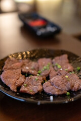 Japanese style sliceJapanese style Yakiniku, sliced grilled beef Zabuton or chuck meat on the plate