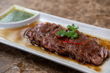 Medium rare sliced fried meat on  plate