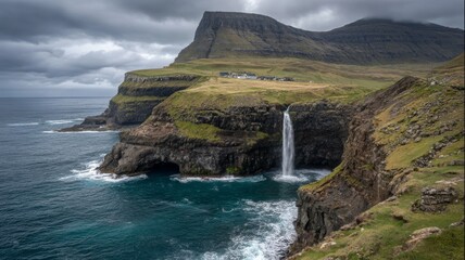 Dramatic view of sørvágsvatn lake meeting the atlantic ocean with sheer coastal cliffs and cascading waterfall on the western faroe islands under clear daylight sky
