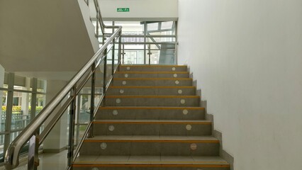 Modern indoor staircase with natural light, perfect for architecture visuals, interior design projects, and building safety content.

