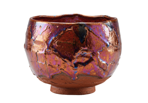 Macro shot of a traditional japanese raku chawan with thick, asymmetrical walls and vibrant, textured copper-red glaze, isolated on a transparent surface. Concept of zen minimalism