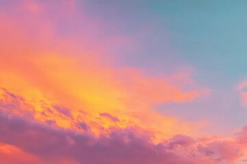 Obraz premium Vibrant Sunset Sky with Soft Clouds in Shades of Orange Pink And Teal