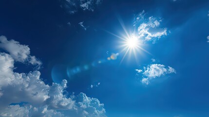 Bright Sun Shining Through White Clouds on a Blue Sky