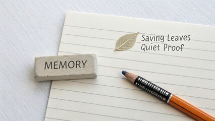 Creative workspace with a notebook, pencil, eraser, leaf illustration, and memory theme, ideal for artistic inspiration and note-taking
