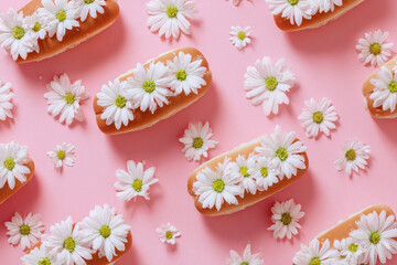 Joyful creative pattern with white flowers in hot dog bun