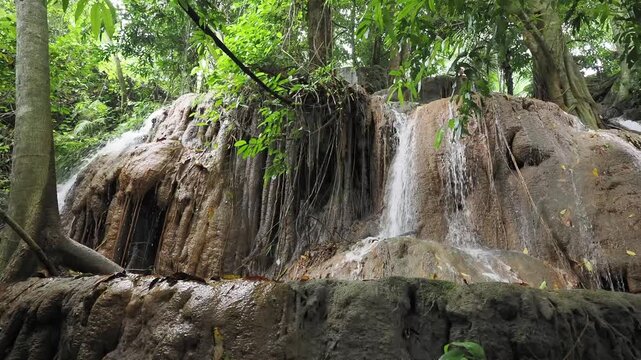 Waterfall made from sedimentary limestone that has accumulated in layers