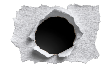Isolated close-up of a roughly torn, jagged hole in white paper revealing darkness