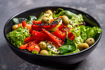 Fresh raw vegetable salad with olives