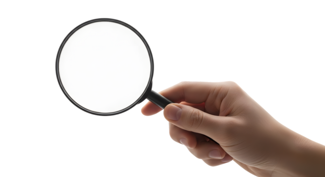 Hand holding a magnifying glass against a black background for investigation