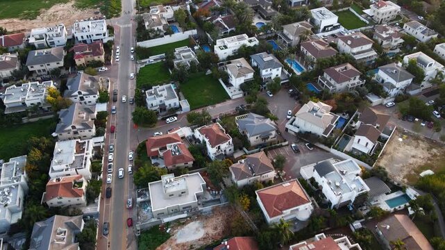 A cinematic view of Hod HaSharon&rsquo;s diverse landscapes, featuring the city&rsquo;s ecological park, surrounding fields, and urban scenery. The footage highlights a peaceful lake, natural greenery, open agric