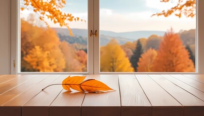 Autumn leaves on the table with serene autumnal Bokeh backdrop.