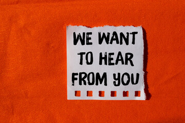 Obraz premium We want to hear from you message written on ripped torn paper background. Conceptual We want to hear from you symbol. Copy space.