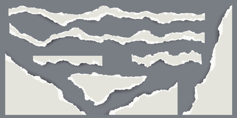 Torn paper with jagged edges on gray background. Pieces of ripped sheets. Notebook fragments for scrapbooking and collage. Retro template with rough details. Realistic paper pieces for design.