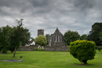 The ancient church of Inniskeen, in County Monaghan, Ireland. It is situated on the banks of the River Fane and was reputedly founded in the 6th century by St. Daig.