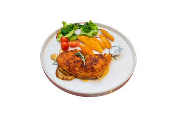 Delicious, appetizing chicken breast, potato fries, and salad served on a plate. The dish is a culinary delight, perfect for a gourmet meal.