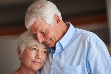 Romance, smile or old couple in house with support, connection or bonding together in retirement. Love, senior man or woman in lounge with care, commitment and relationship security in home.