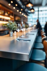 Fototapeta premium Modern bar counter with blurred background and warm lighting