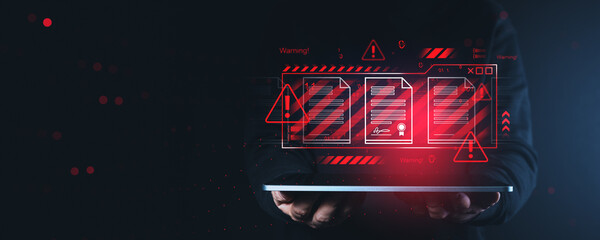 Cybersecurity warning concept with digital documents and alert icons above tablet held by person on...